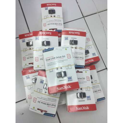 a pile of brochures on the floor