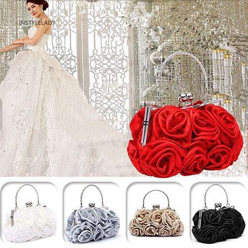 the bag is made of silk and the flowers are in red.
