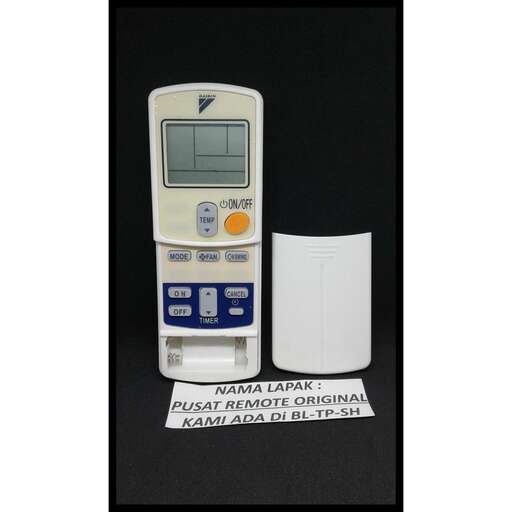 a display of a calculator and a paper lamp.