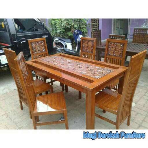 a table and chairs set for a small space.