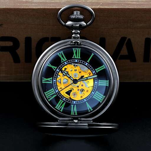 a pocket watch with a blue face and green dial.