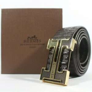 a leather belt with a metal buckle.