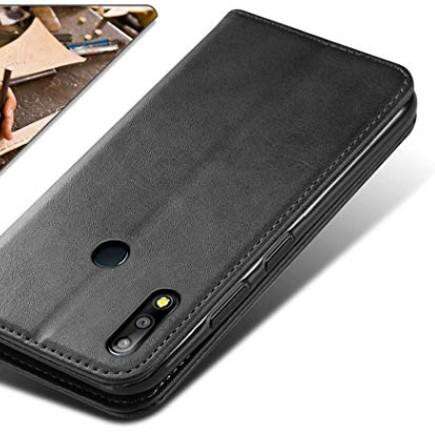 a black cell phone with a black case on it.