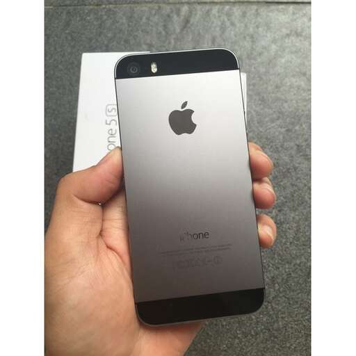 the iphone x is in a hand.