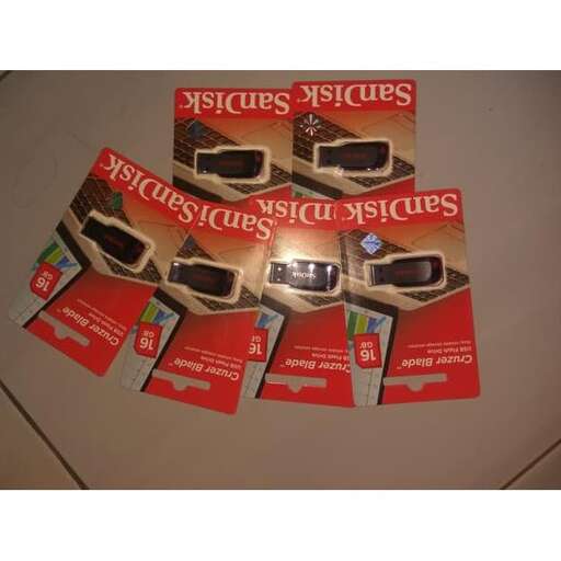 a collection of brochures on a table.