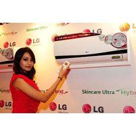 a woman in a red dress pointing at a white remote control.