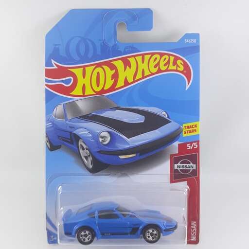 a toy car and a car in a box