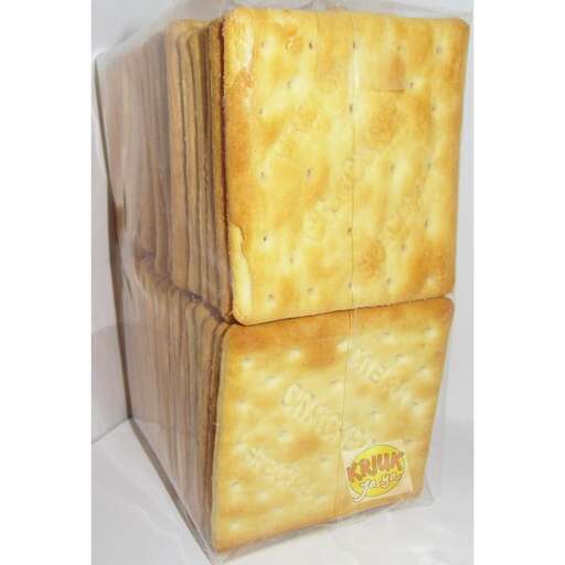 a stack of cheeses in a box