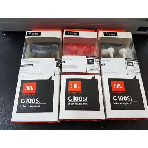 a set of three packages with different items in them.