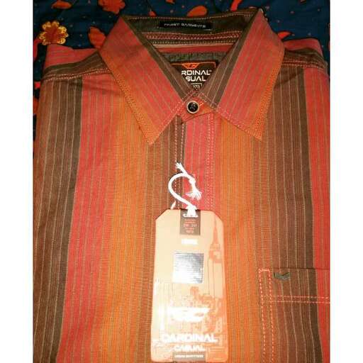 a red and black striped shirt with a tag on it.