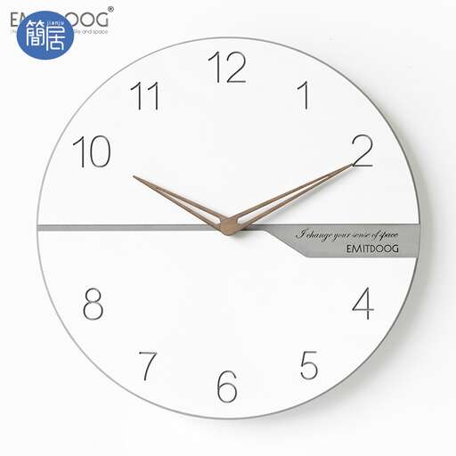 a wall clock with a white face and hands.