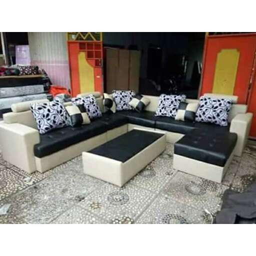 a living room with a couch and a table.