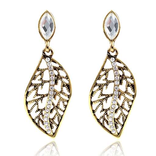 a pair of earrings with diamonds in the shape of a flower.