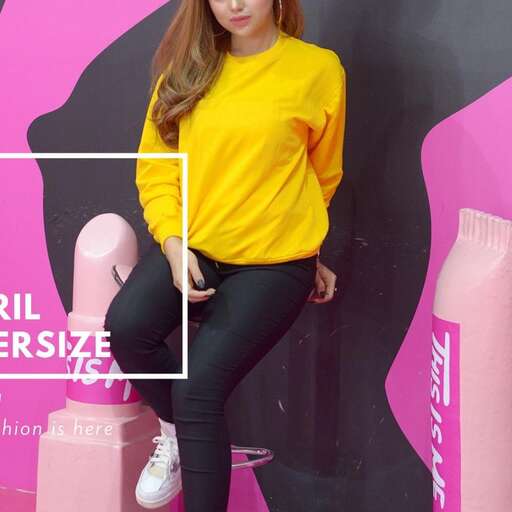 person in a yellow top and black leggings