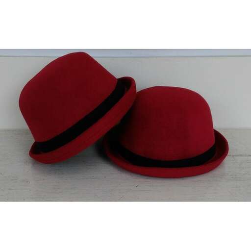 vintage red felted hat with black ribbon around the top.