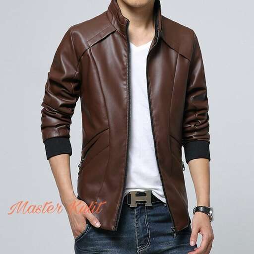 a man in a leather jacket and jeans.