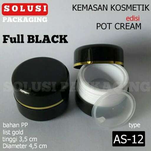 a black and white container with a gold band around it.