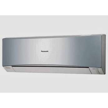 a silver refrigerator freezer in a white room.