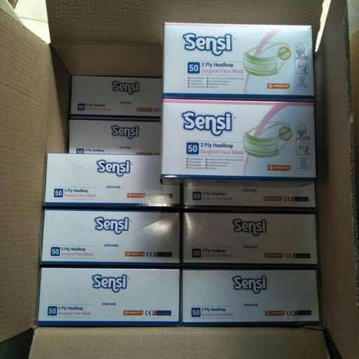 a box of toilet paper is sitting in a box.