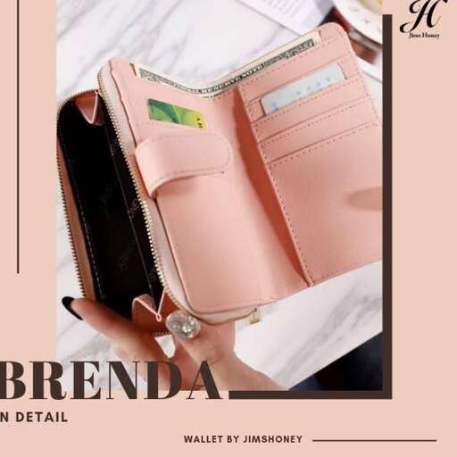 a woman holding a briefcase with a ring on it.