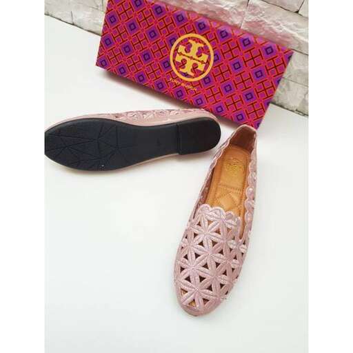a pair of shoes with a wooden shoe.