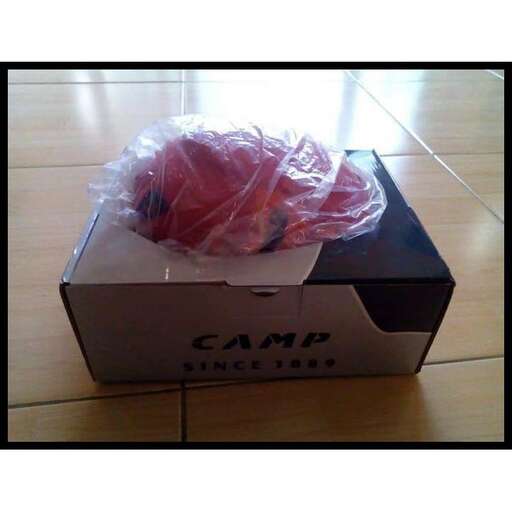 a box with a pink bag inside of it.