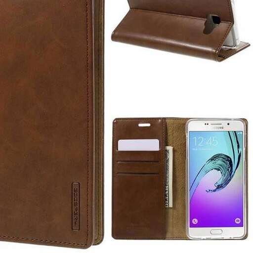 a brown leather wallet with a cell phone on it.