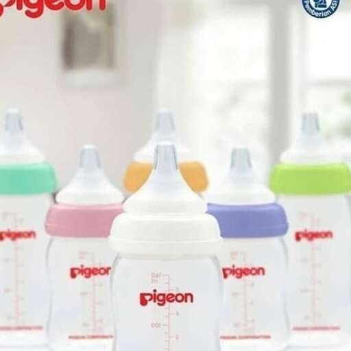 a bottle of baby food is shown with a baby bottle.