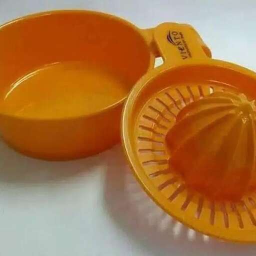 a orange bowl and orange bowl on a table.