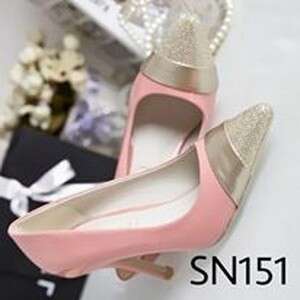 i'm not sure what this shoe is, but i'm pretty sure it's a pink color.