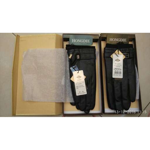 a pair of black pants are sitting on a box.