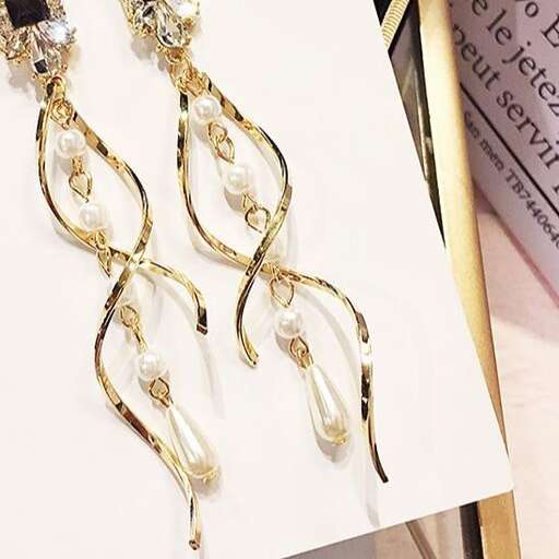 a pair of earrings, earrings and earrings