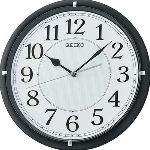 a clock with a white face and black hands