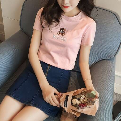 i love the pink shirt with the pink flower on the front.