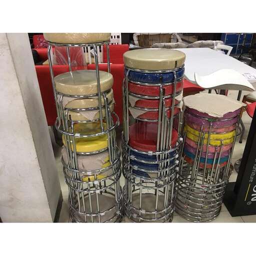 a collection of metal bars with different colored designs.