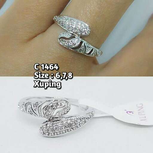 a pair of rings with a tag