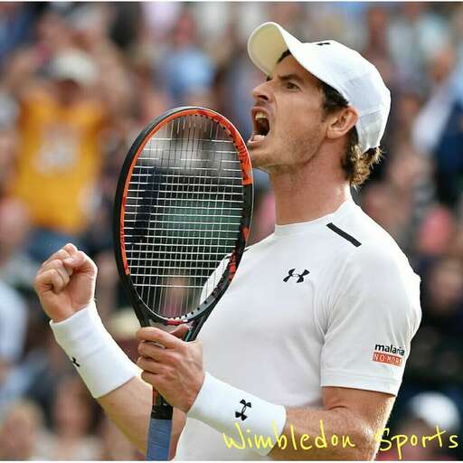 a man holding a tennis racket in his hand.