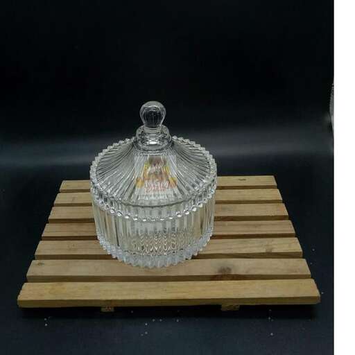 glass bowl on a wooden tray
