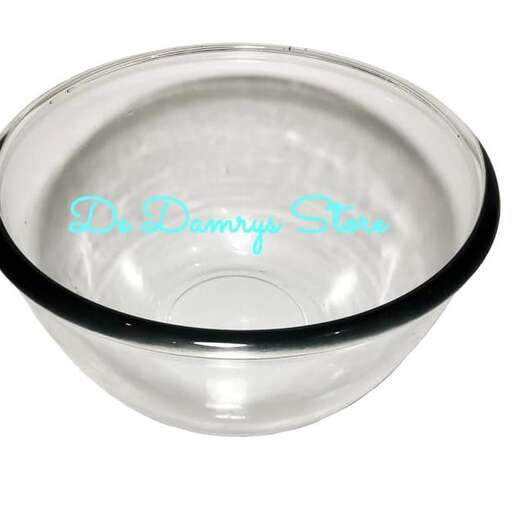 a glass bowl with a black border
