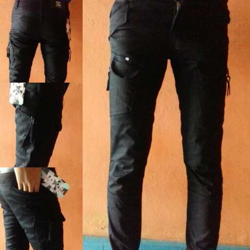 a pair of black jeans with a broken leg