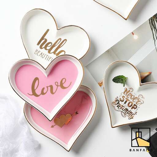 a collection of handmade paper heart shaped cards.