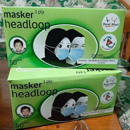 a pair of boxes with a headband on them.