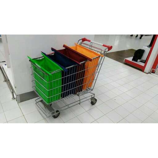 a shopping cart full of colorful desks.