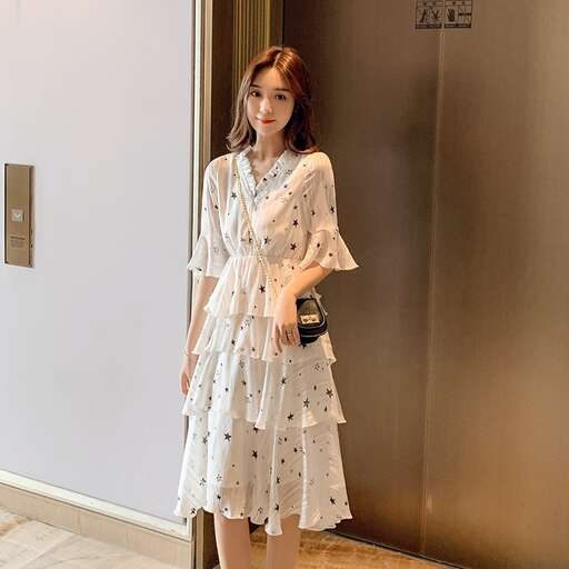 person in a floral dress