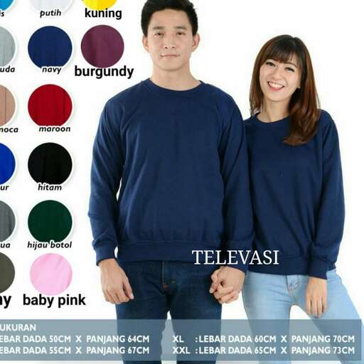 a blue sweater with a pink and green color.