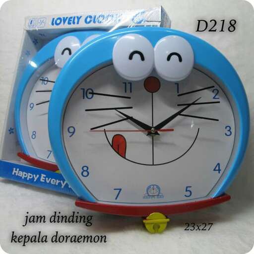 a cat clock with a face on it.