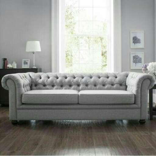 a living room with a couch and a table