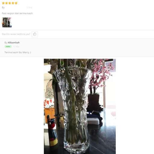 a vase with flowers in it sitting on a table.