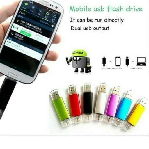 a person holding a cell phone next to colorful buttons.