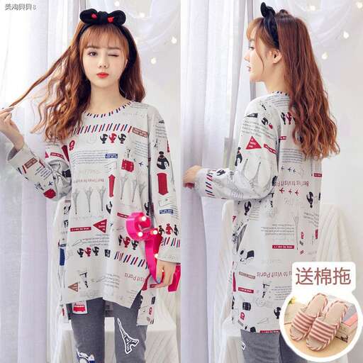 person is a long - sleeved sweater with a cute bow on the front and back.